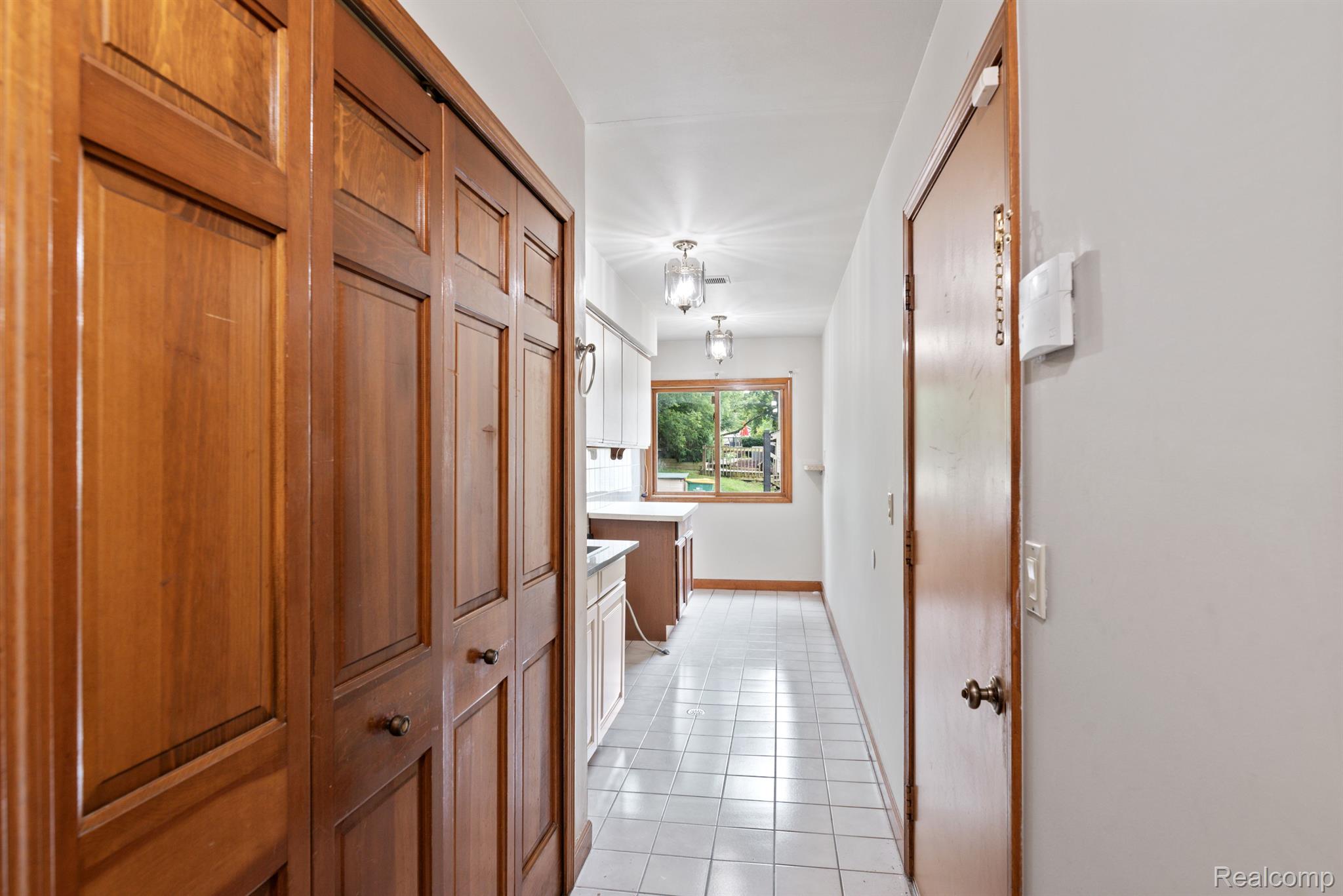 24660 Power Road Farmington, MI 48336 - Photo 26 of 26 Hall to laundry room