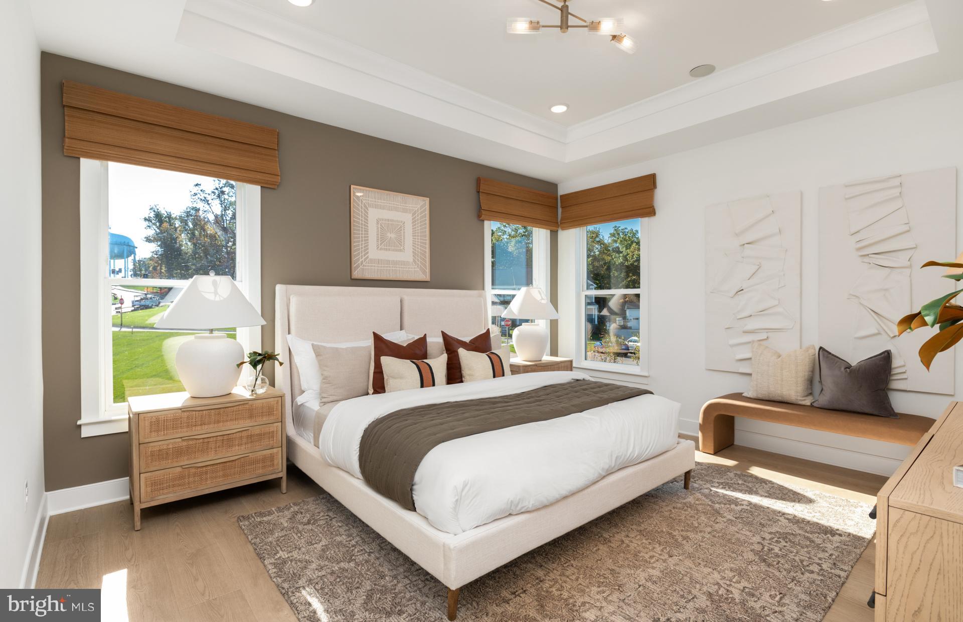 18279 Cresswell Rst Lane Leesburg, VA 20176 - Photo 27 of 60 a bedroom with a bed and a couch