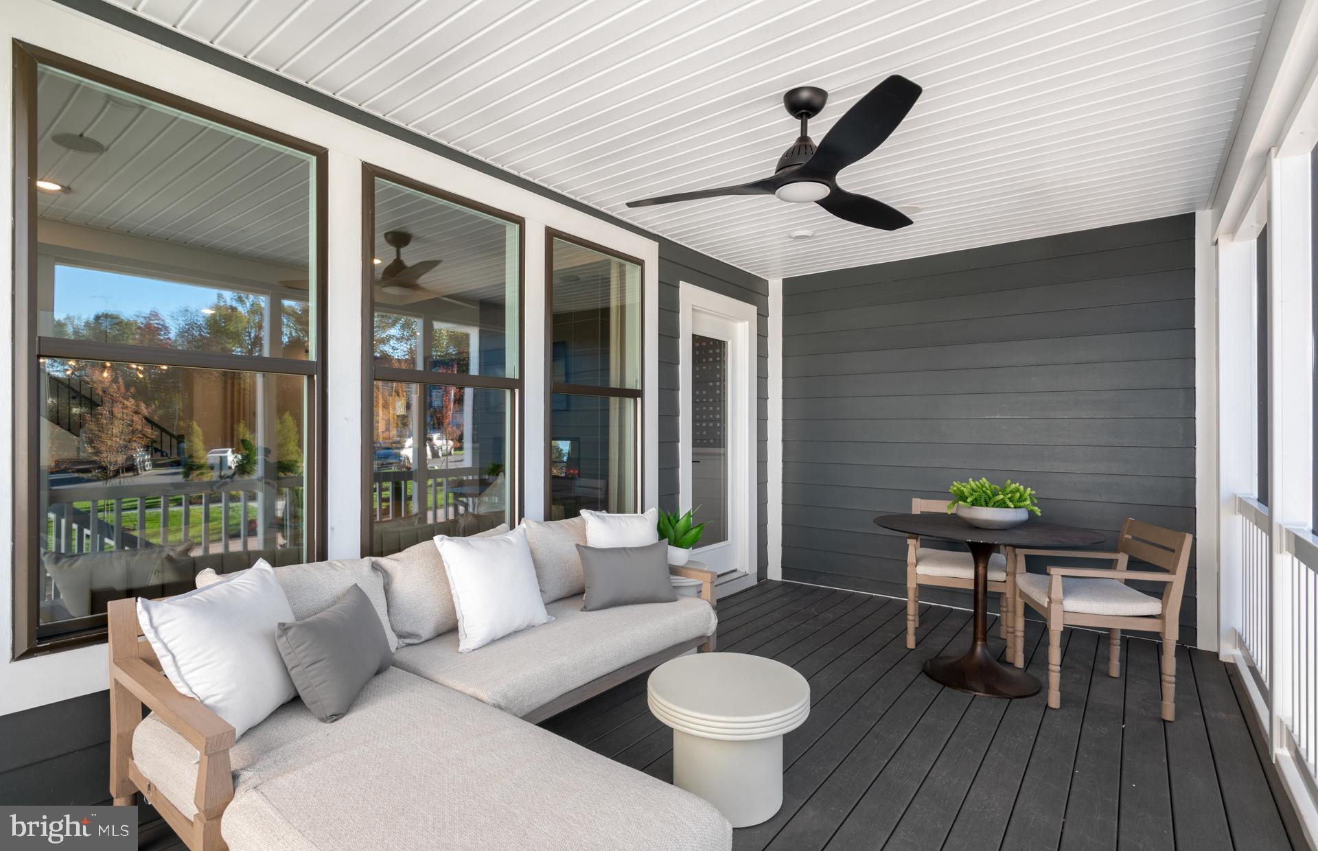 18279 Cresswell Rst Lane Leesburg, VA 20176 - Photo 43 of 60 a view of a patio with a dining table and chairs