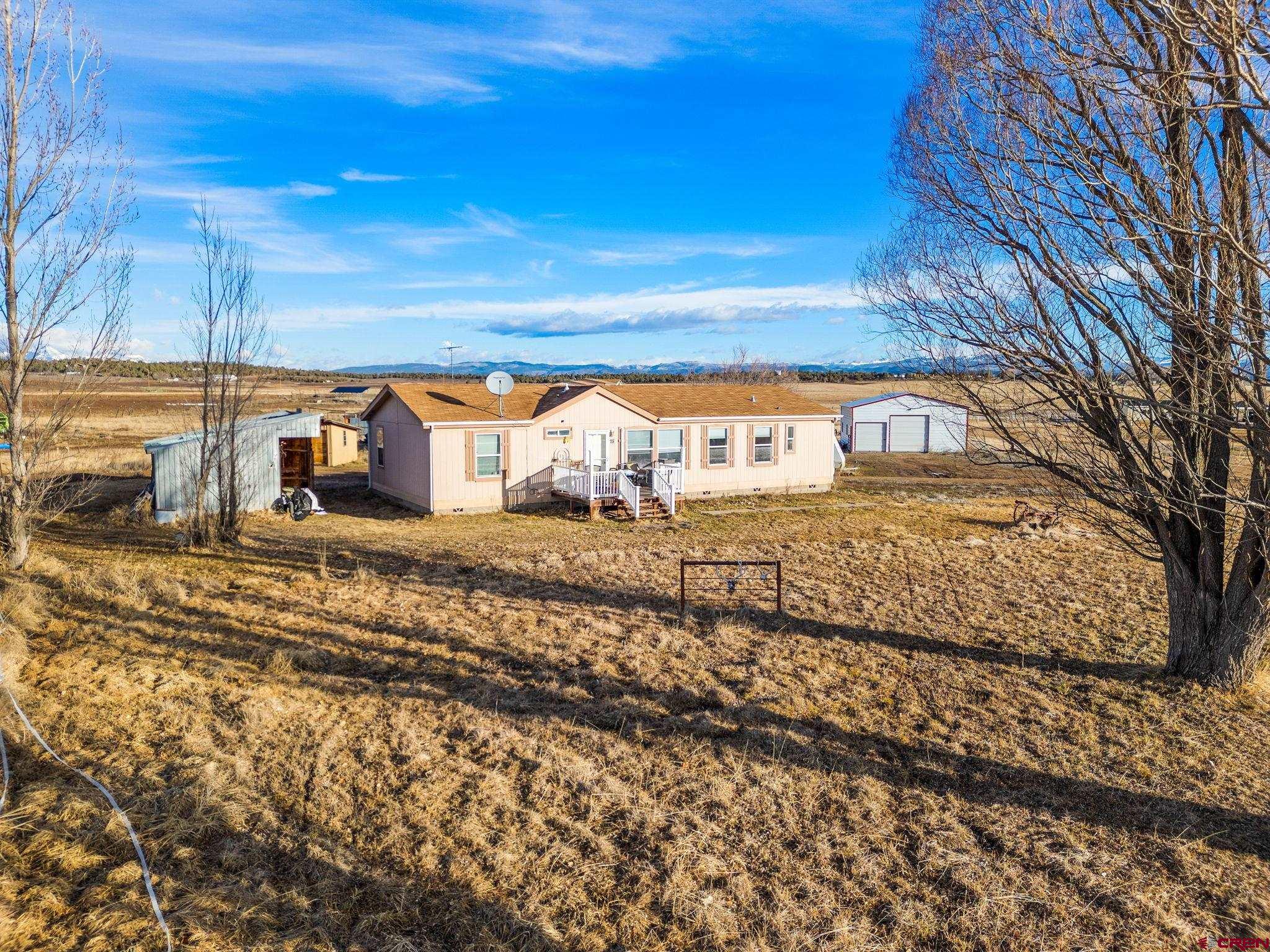 75 Sundial Lane Ignacio, CO 81137 - Photo 1 of 31 a view of a street with a building in the background
