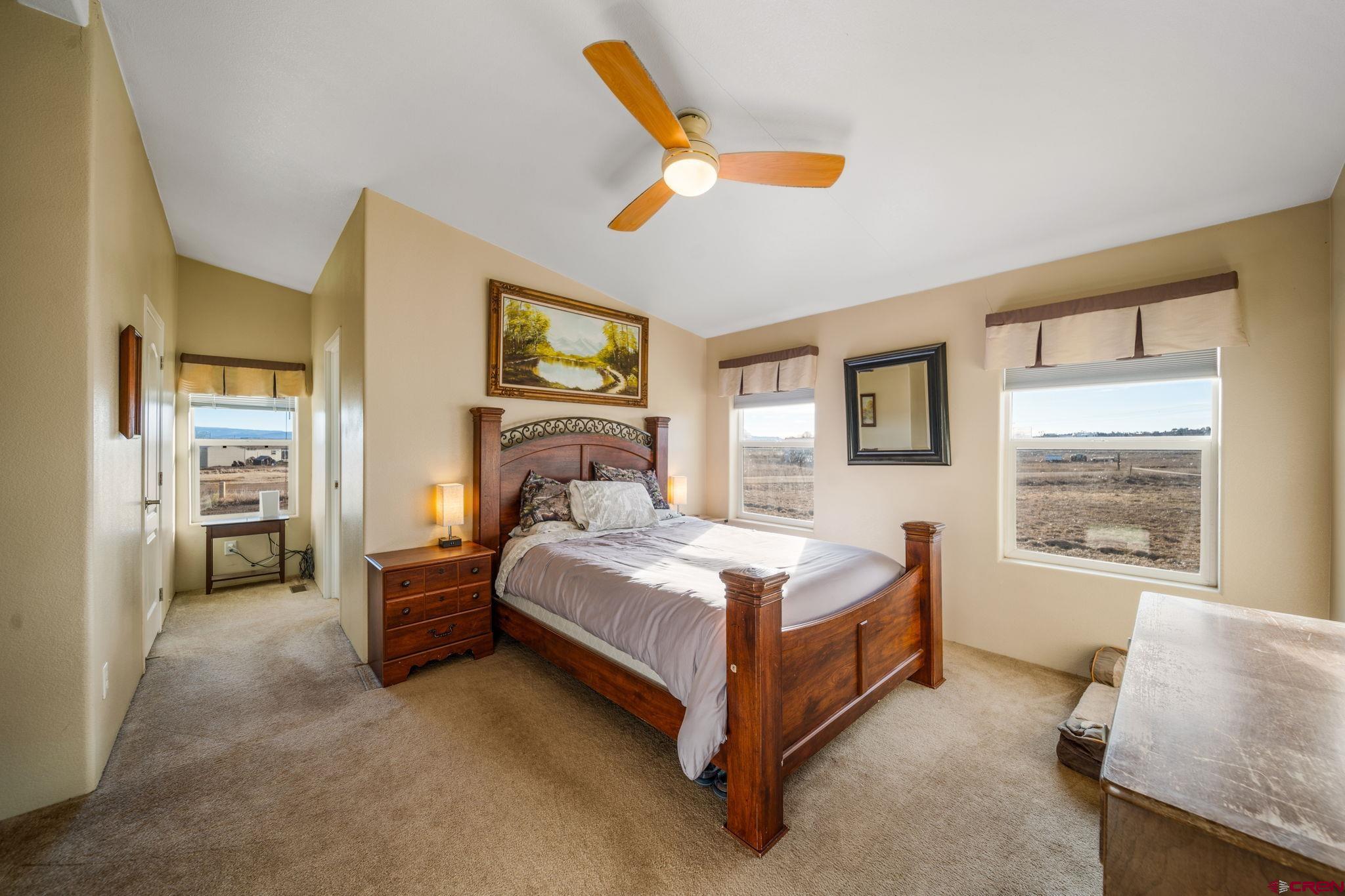 75 Sundial Lane Ignacio, CO 81137 - Photo 13 of 31 a bedroom with a bed and a window