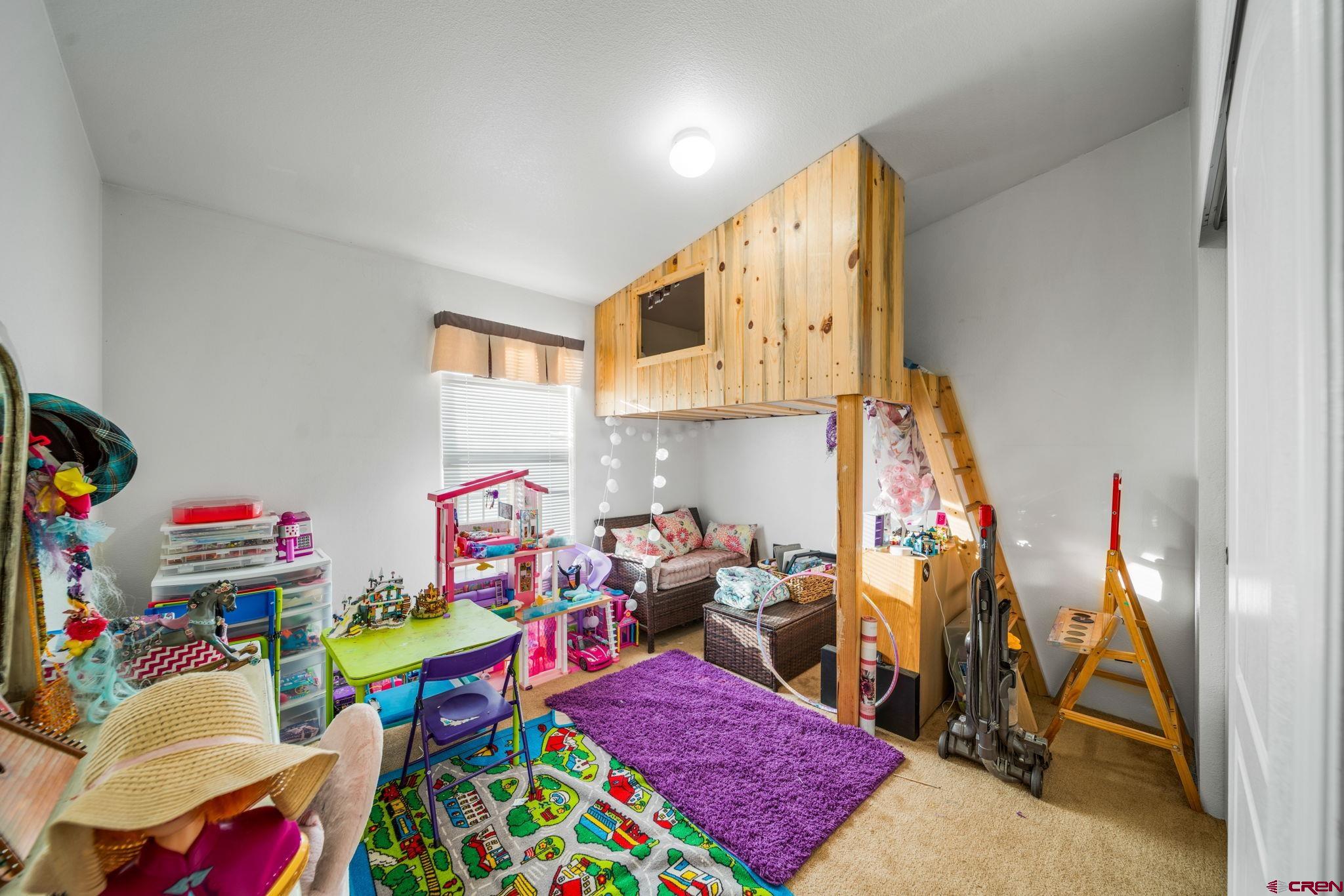 75 Sundial Lane Ignacio, CO 81137 - Photo 17 of 31 a play room with toys