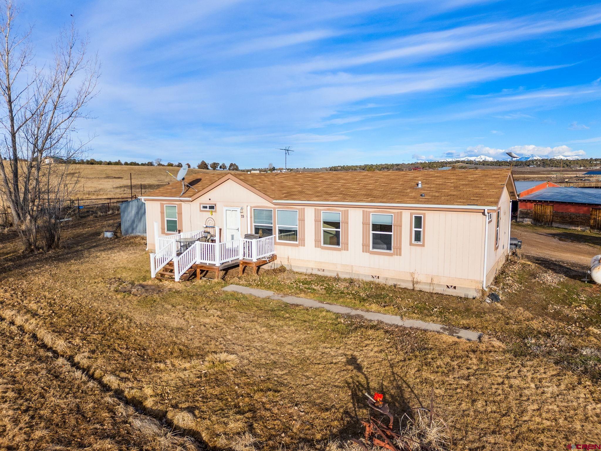 75 Sundial Lane Ignacio, CO 81137 - Photo 2 of 31 a view of a house with a yard