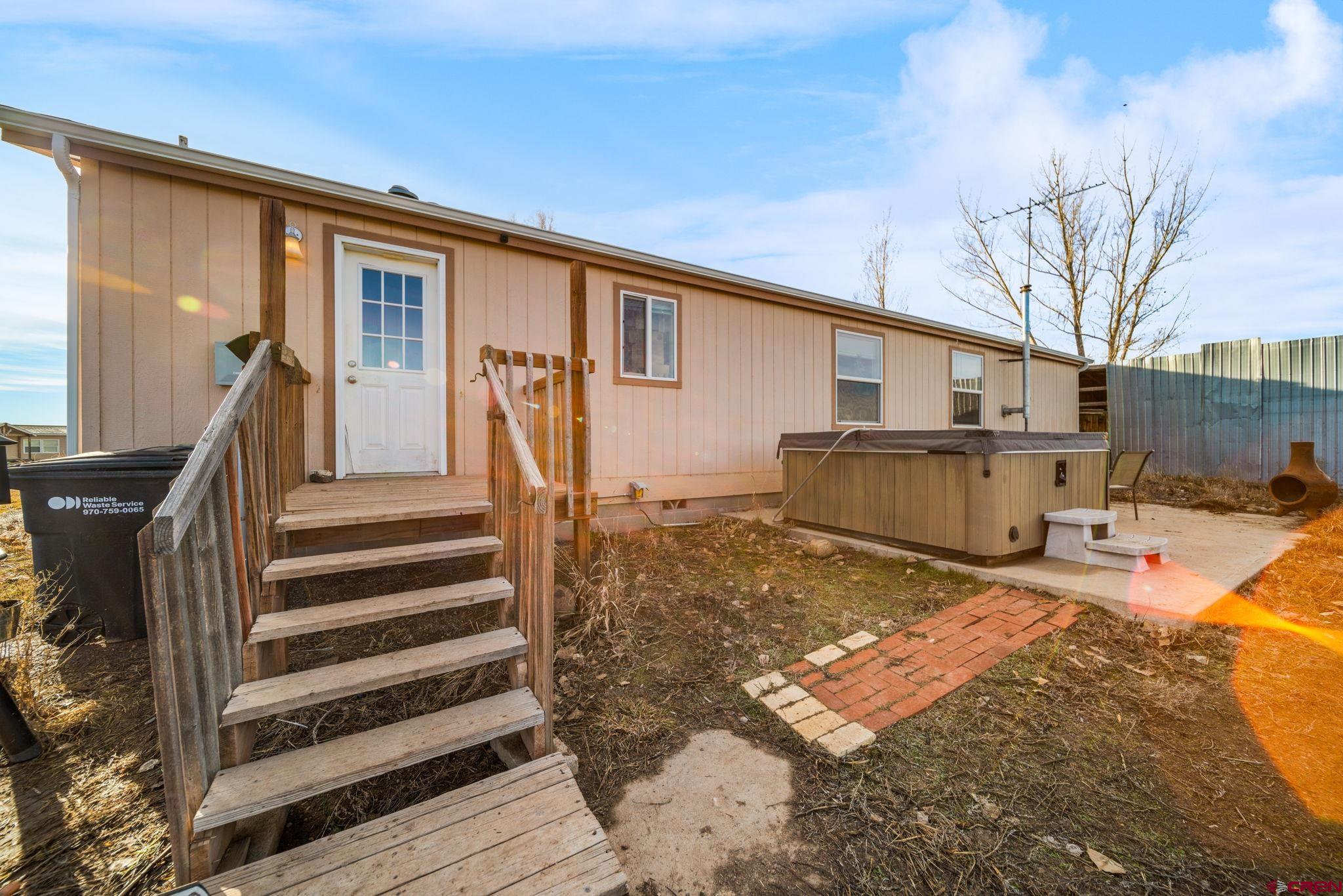 75 Sundial Lane Ignacio, CO 81137 - Photo 22 of 31 a view of a house with backyard and sitting area