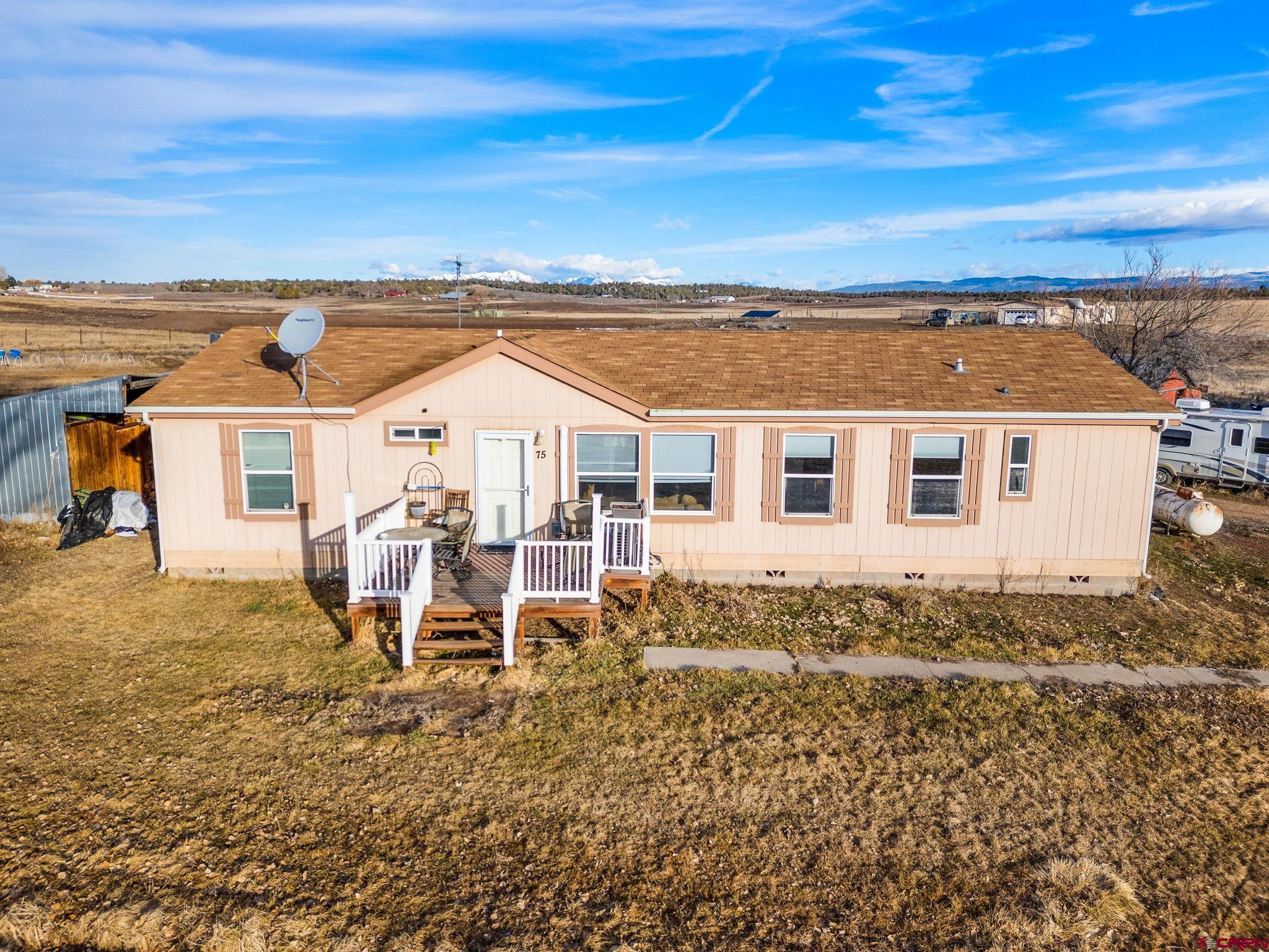 75 Sundial Lane Ignacio, CO 81137 - Photo 31 of 31 a view of a house with wooden deck