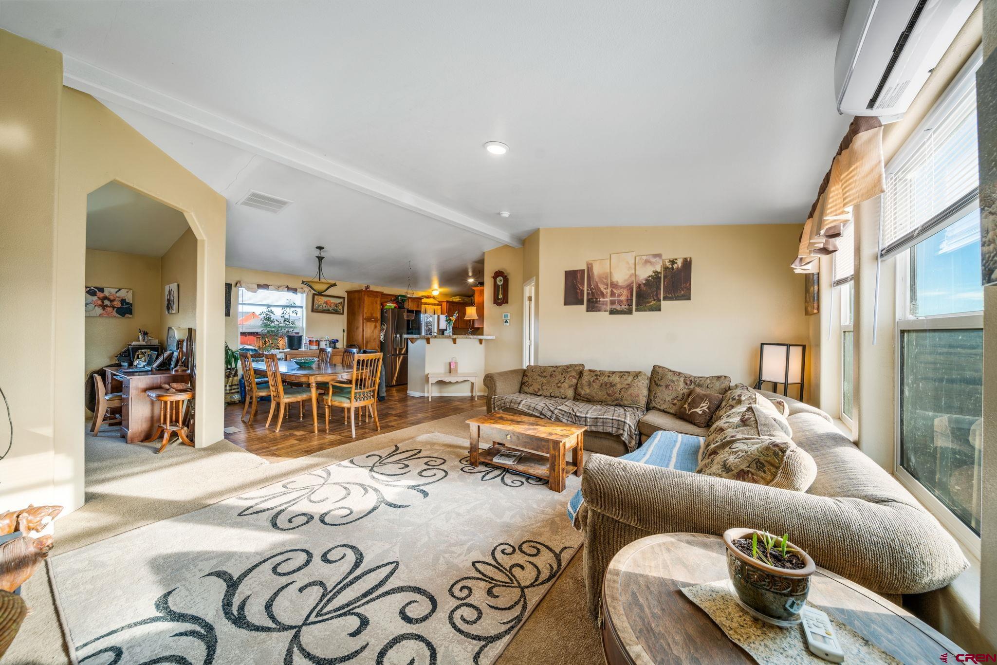 75 Sundial Lane Ignacio, CO 81137 - Photo 7 of 31 a living room with furniture and a large window