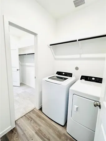 a utility room with dryer and washer