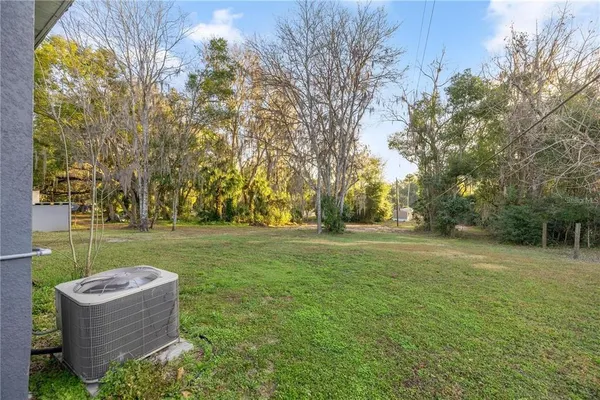a view of outdoor space and yard