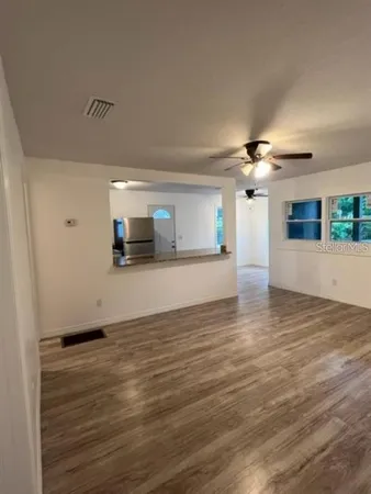 a view of a livingroom with a staircase