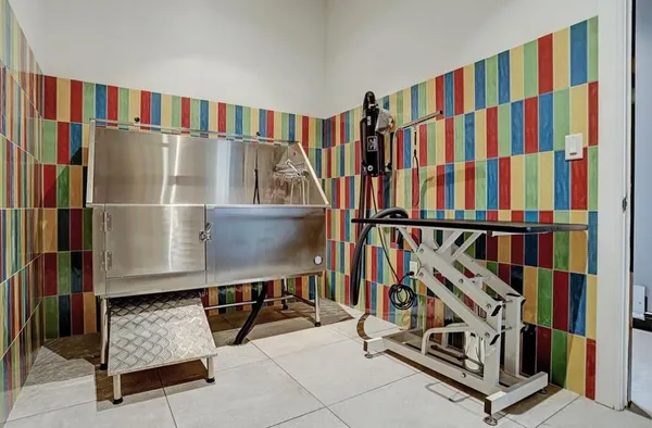a bathroom with a bathtub and shower