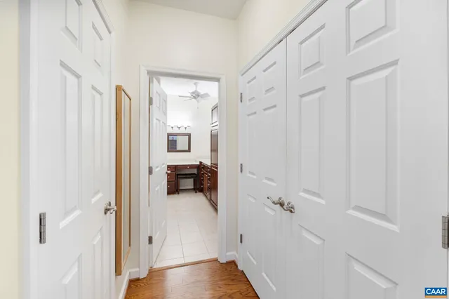a spacious bathroom with a double vanity sink mirror and double
