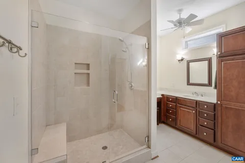 a view of a storage and utility room with washer and dryer