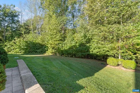 a view of a yard with green space