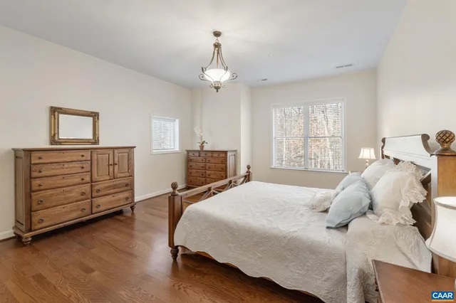 a bathroom with 2 sink and a mirror