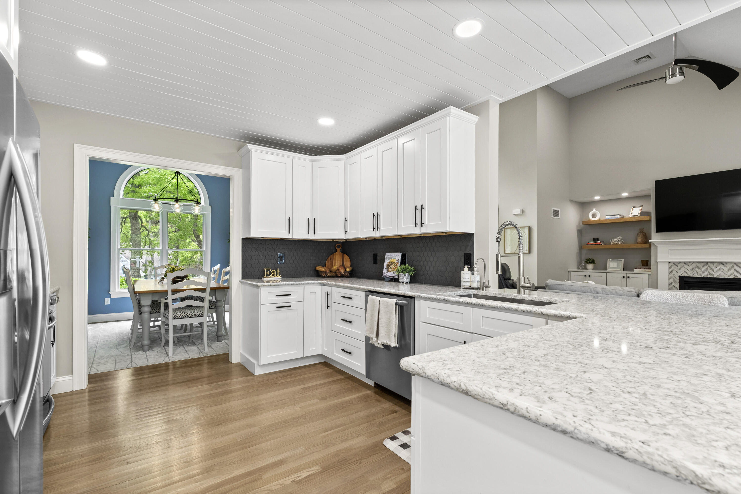 102 Cairn Ridge Road East Falmouth, MA 02536 - Photo 13 of 56 a kitchen with granite countertop white cabinets and appliances