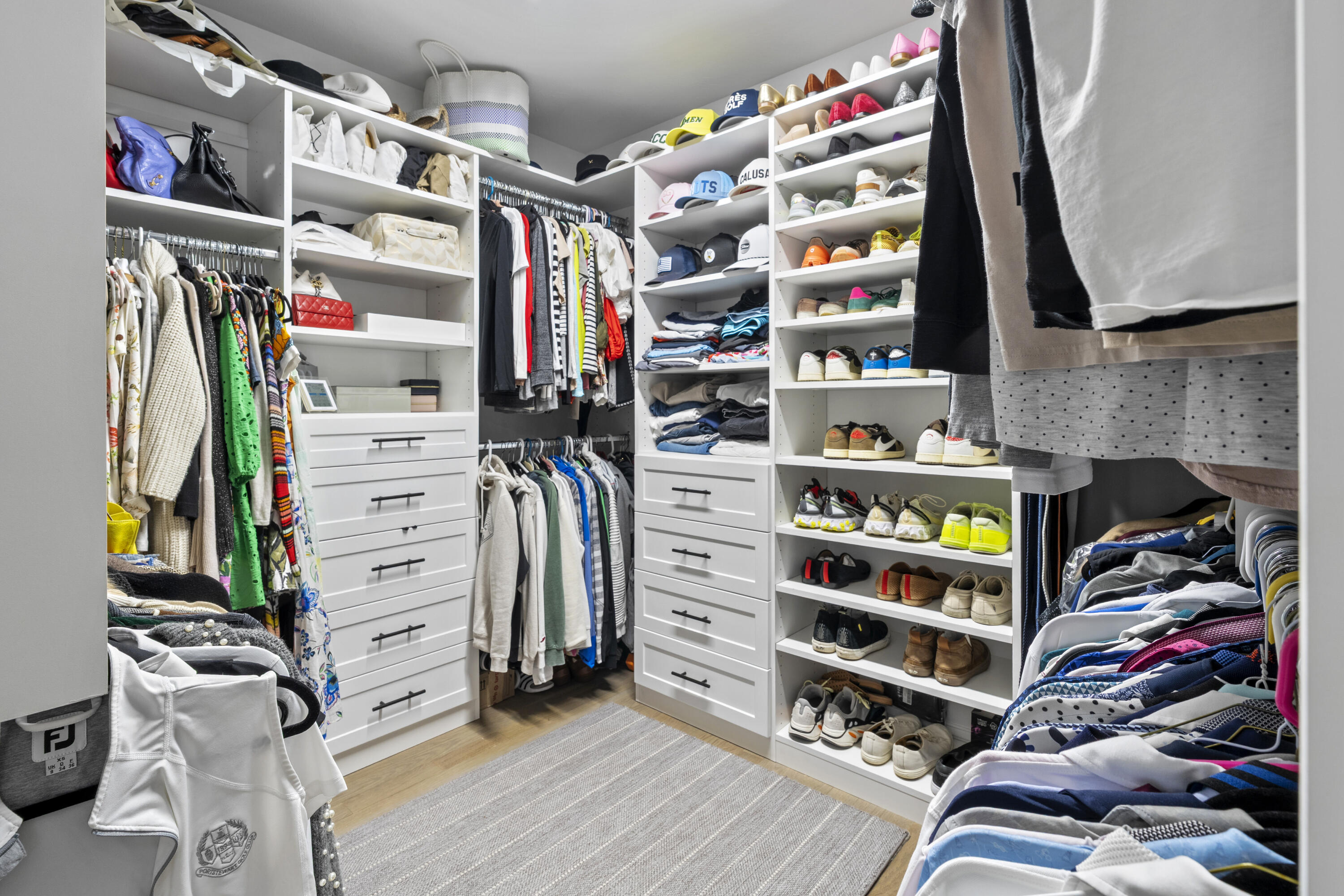 102 Cairn Ridge Road East Falmouth, MA 02536 - Photo 20 of 56 a view of walk in closet with clothes and shoes