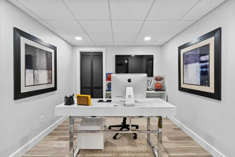 a living room with furniture and a table