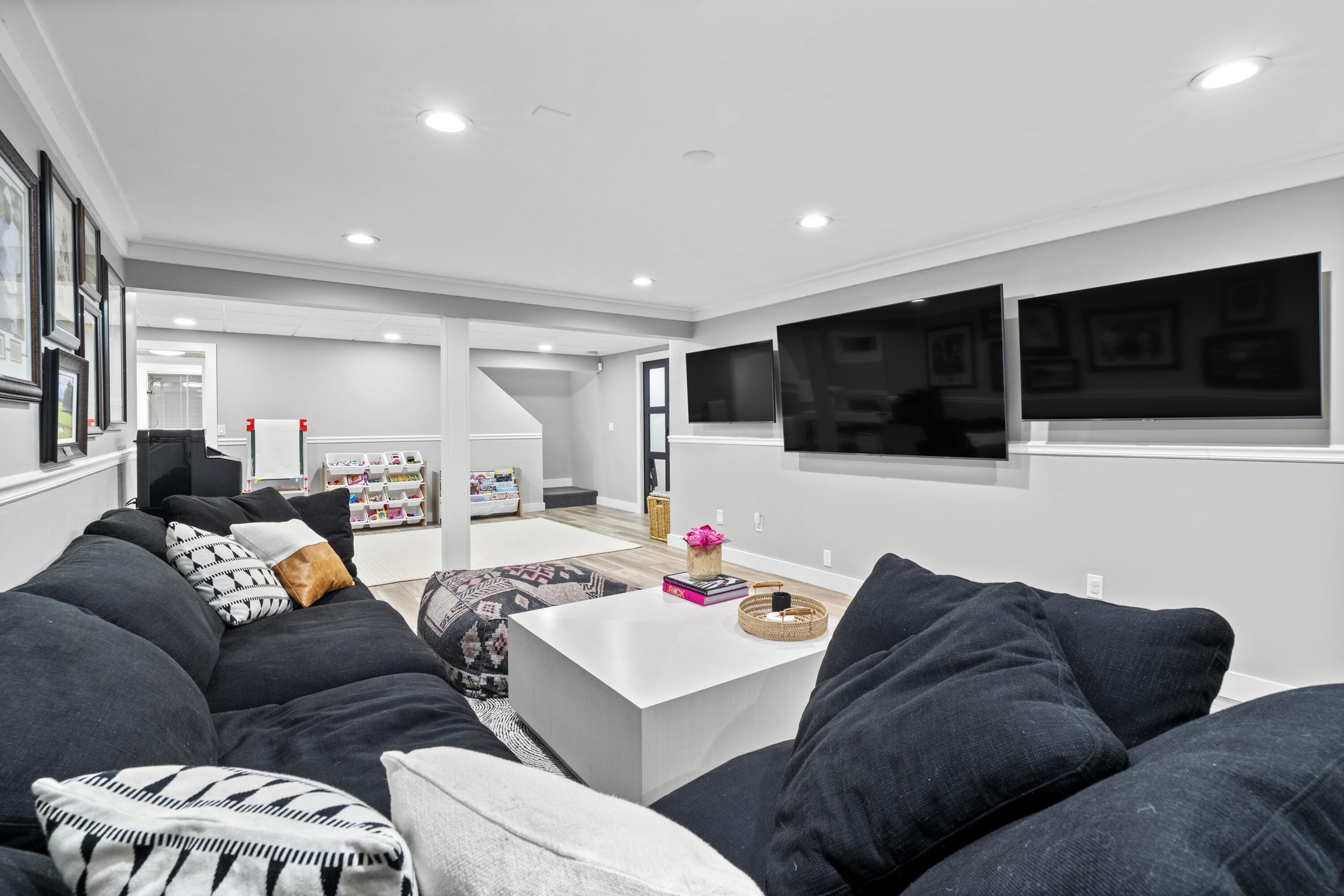 102 Cairn Ridge Road East Falmouth, MA 02536 - Photo 37 of 56 a living room with furniture and a flat screen tv