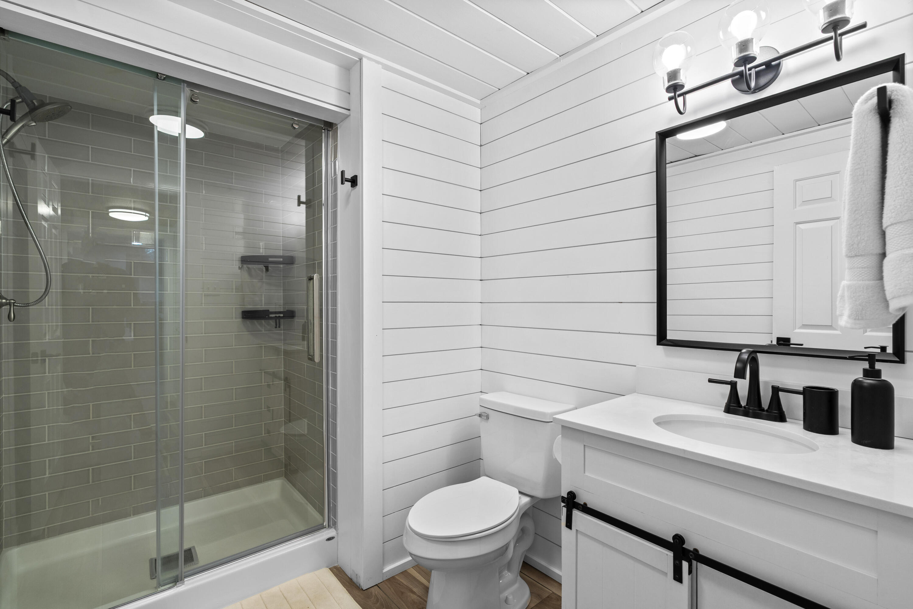 102 Cairn Ridge Road East Falmouth, MA 02536 - Photo 39 of 56 a bathroom with a sink a toilet and shower