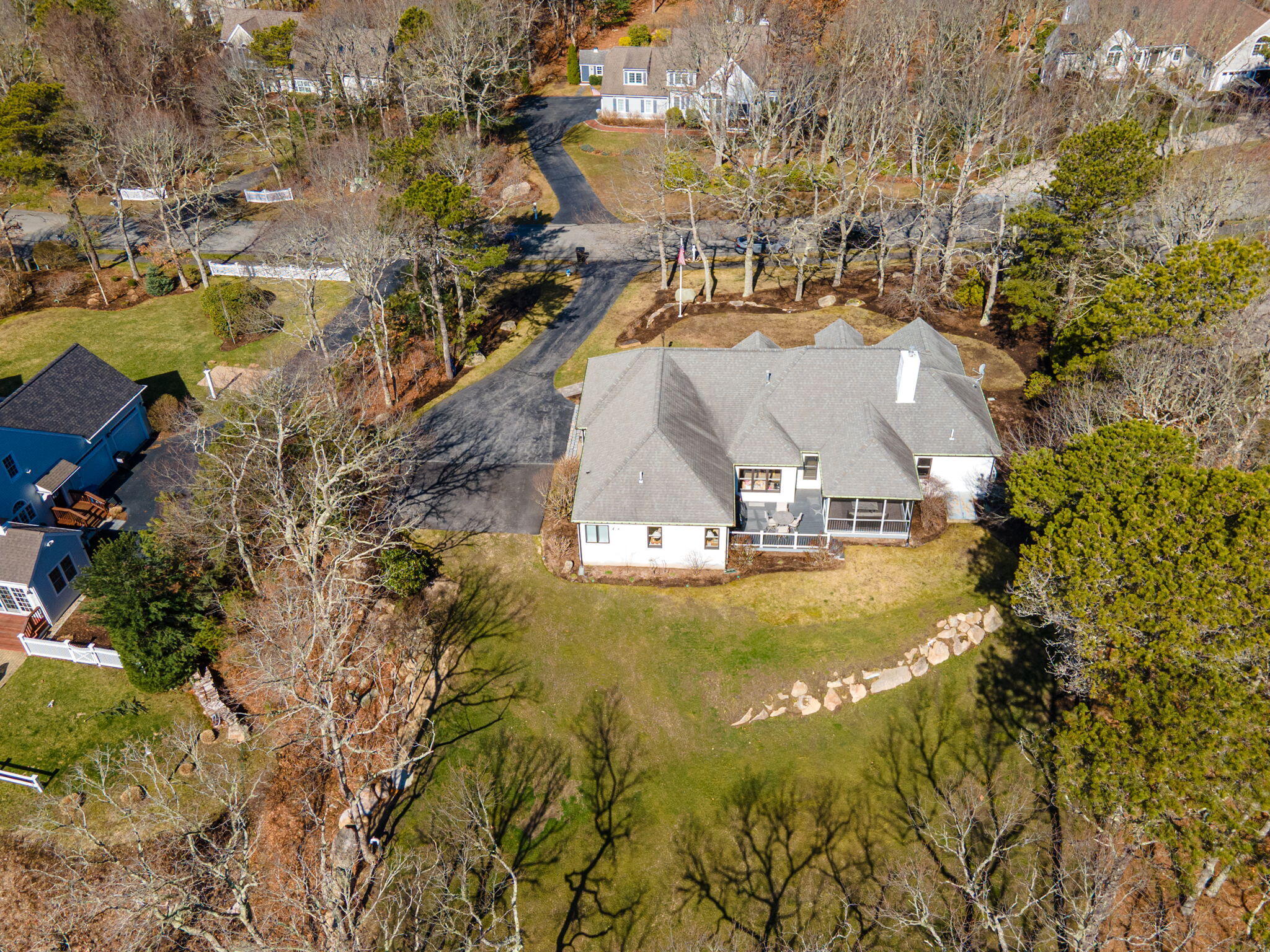 102 Cairn Ridge Road East Falmouth, MA 02536 - Photo 49 of 56 an aerial view of residential houses with outdoor space