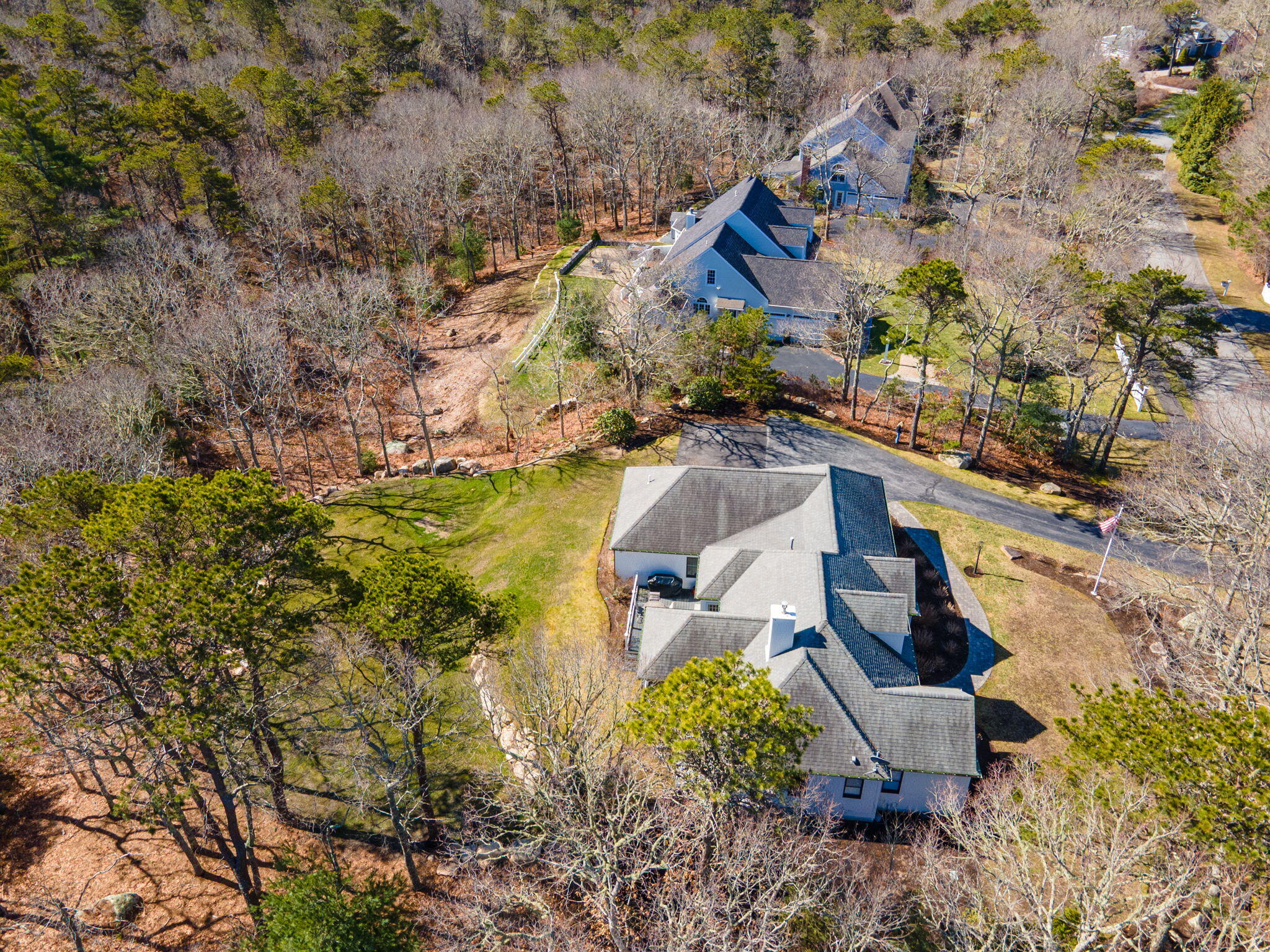 102 Cairn Ridge Road East Falmouth, MA 02536 - Photo 54 of 56 a aerial view of a house with a yard