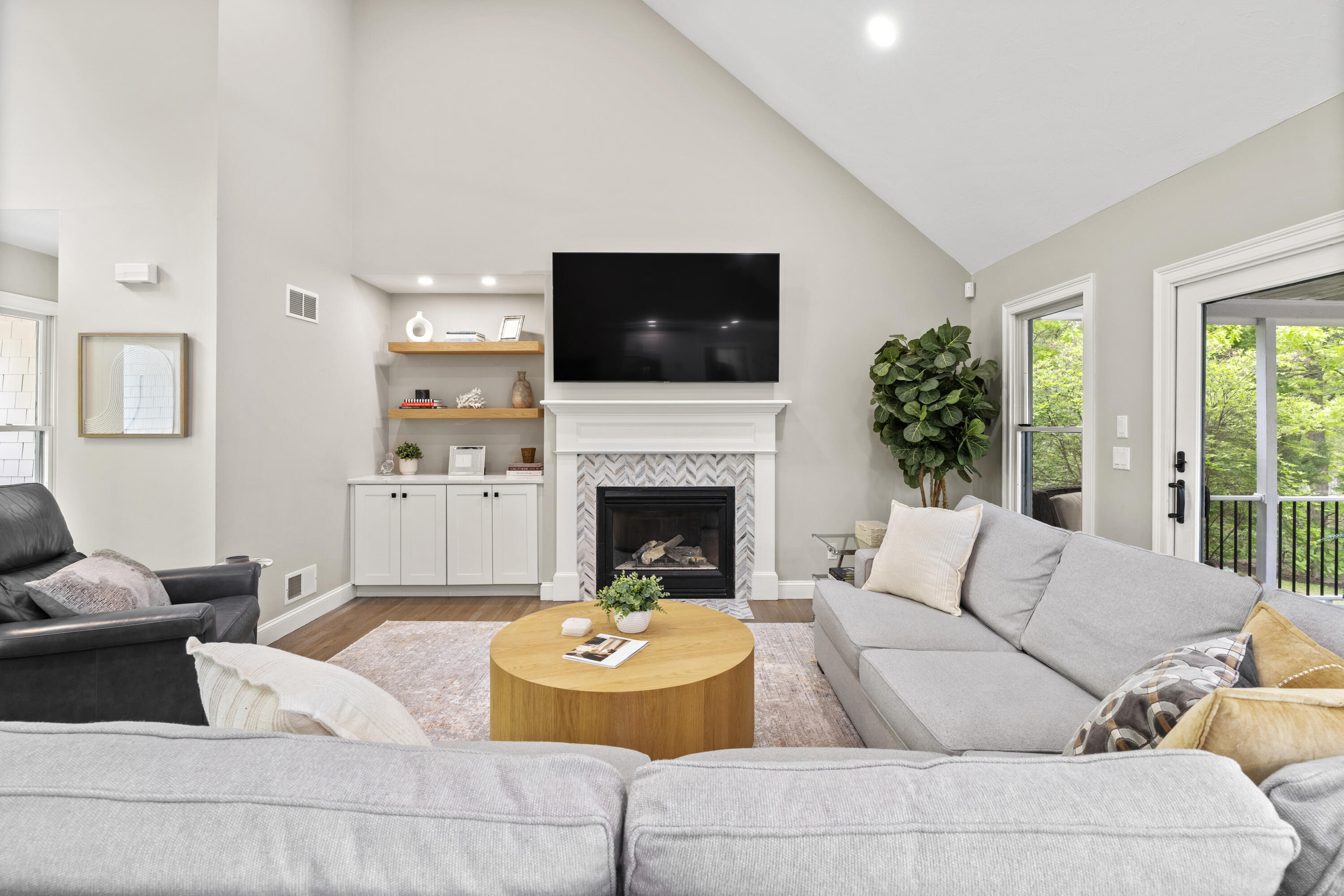 102 Cairn Ridge Road East Falmouth, MA 02536 - Photo 7 of 56 a living room with furniture and a fireplace