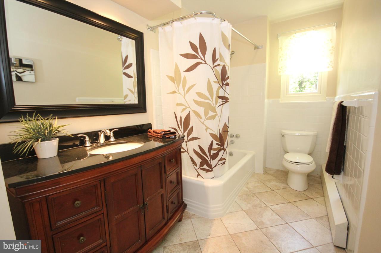 702 Apple Grove Road Silver Spring, MD 20904 - Photo 14 of 30 Main Level Hall Bath