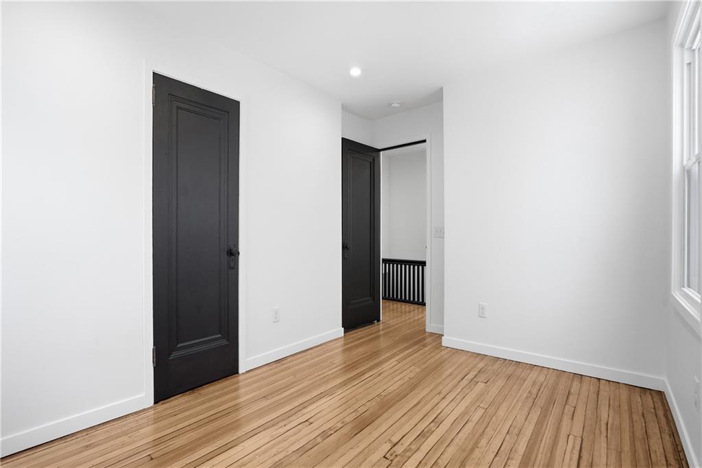 1402 Dickson Street Pittsburgh, PA 15212 - Photo 18 of 25 a view of hallway with wooden floor