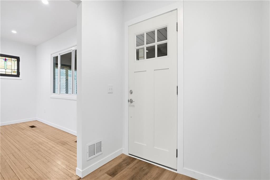 1402 Dickson Street Pittsburgh, PA 15212 - Photo 2 of 25 a view of a hallway with workspace