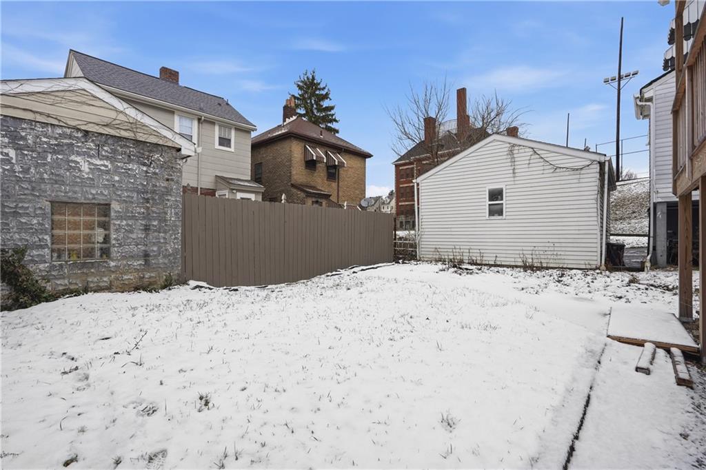 1402 Dickson Street Pittsburgh, PA 15212 - Photo 24 of 25 a view of a house with a yard