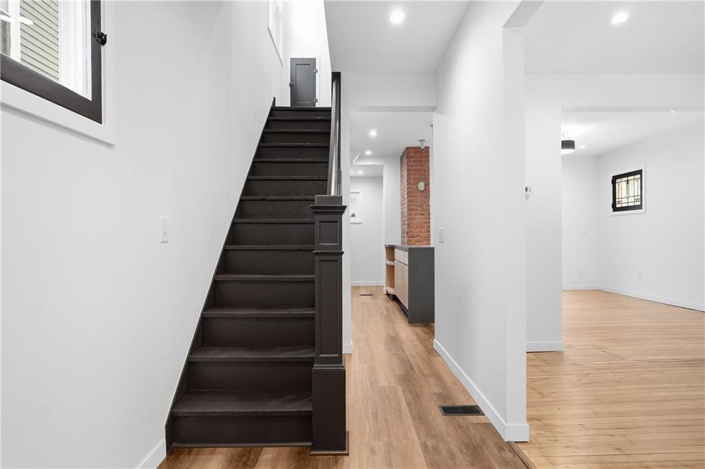 1402 Dickson Street Pittsburgh, PA 15212 - Photo 3 of 25 a view of entryway and gallery with wooden floor