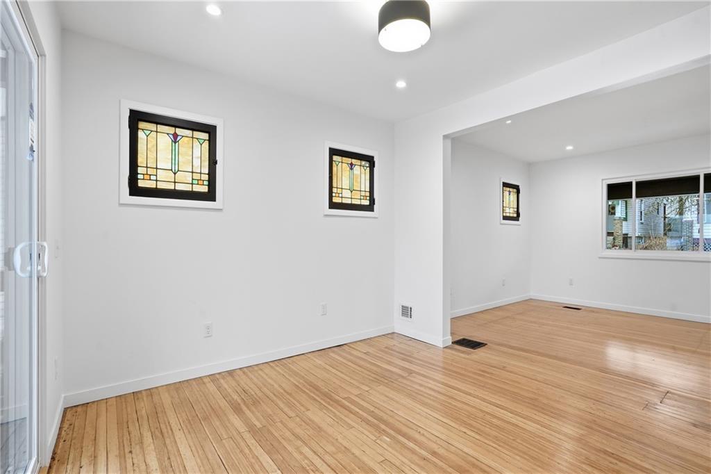 1402 Dickson Street Pittsburgh, PA 15212 - Photo 8 of 25 a view of empty room with wooden floor