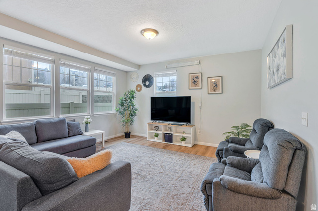 11007 Birch Creek Road South Jordan, UT 84095 - Photo 2 of 35 A bright open great room with room for both entertaining & relaxing while connecting to the main living areas
