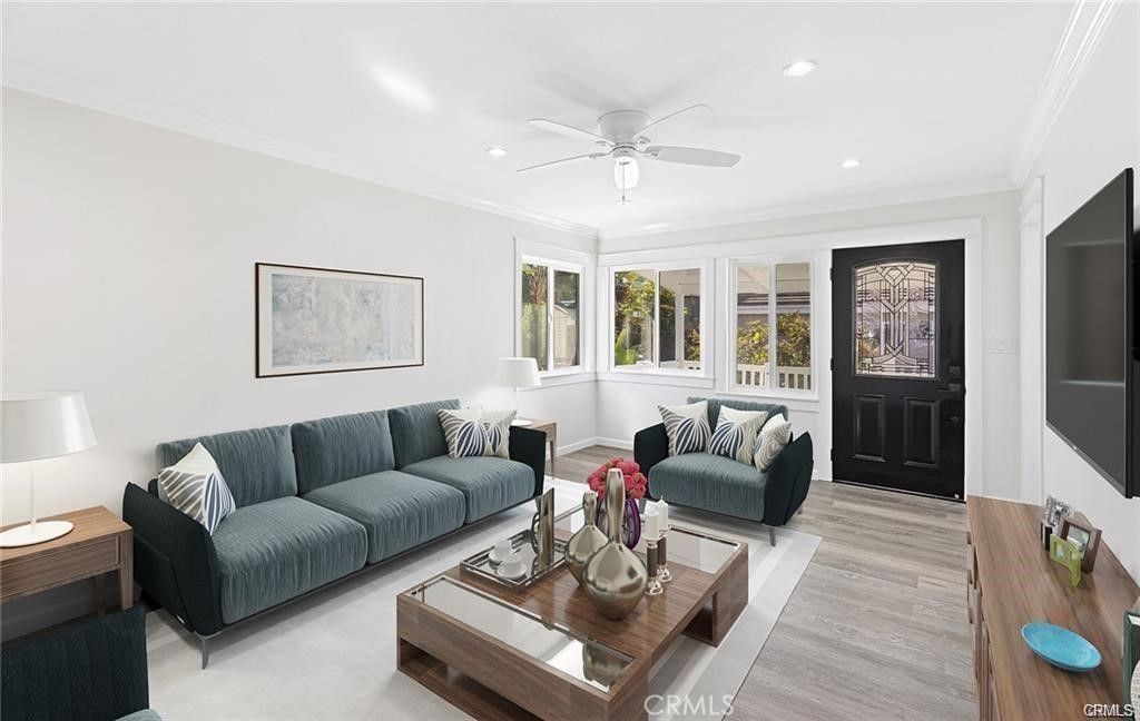 817 Calle Puente, Unit A San Clemente, CA 92672 - Photo 1 of 8 a living room with furniture and a view of kitchen