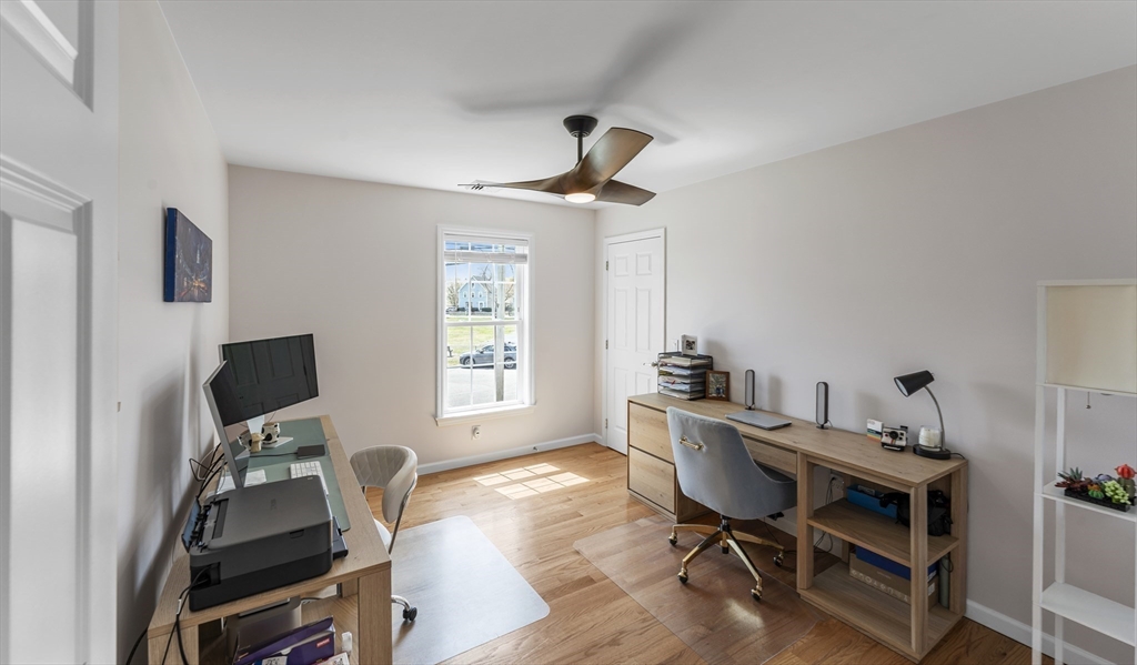 106 Colonial Road Marshfield, MA 02050 - Photo 12 of 16 a work room with furniture and windows