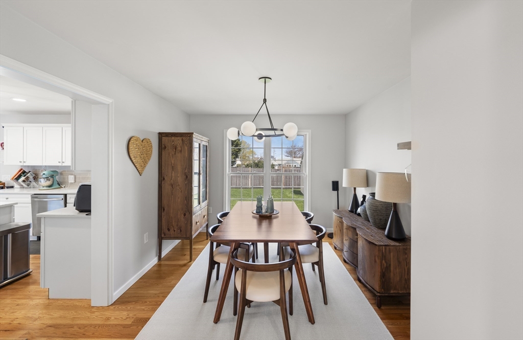 106 Colonial Road Marshfield, MA 02050 - Photo 4 of 16 a dining room with furniture and window