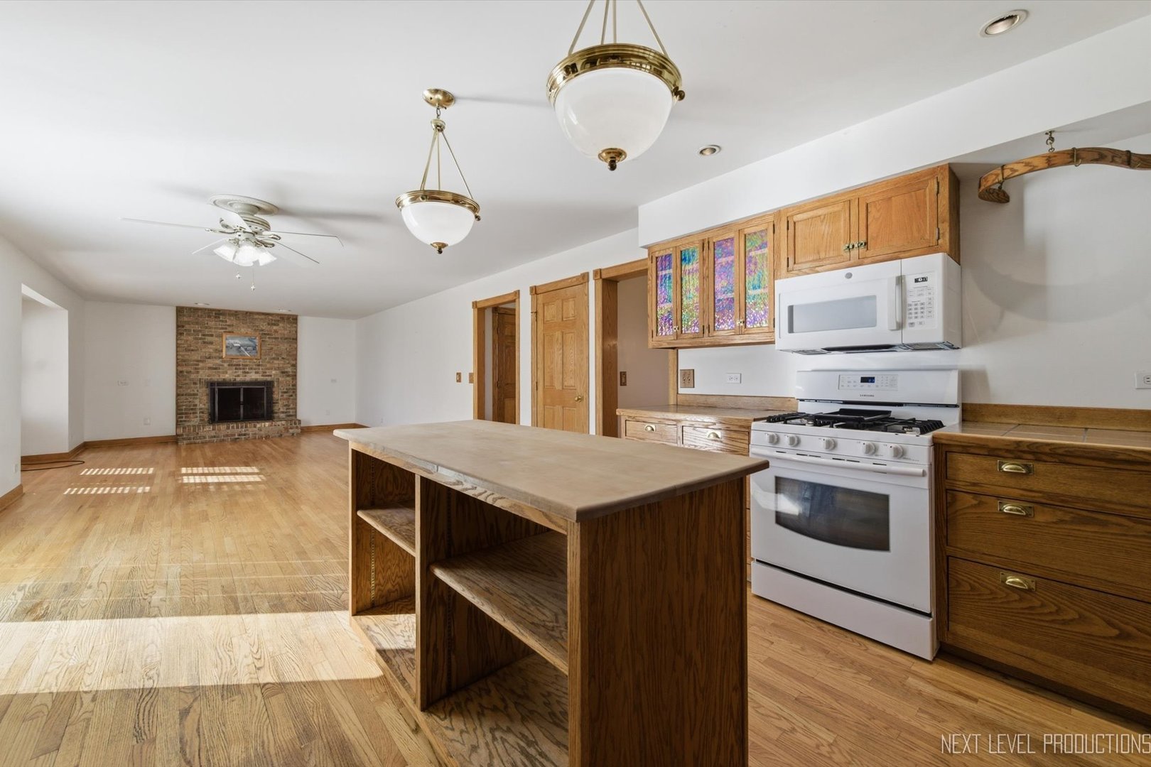 2N879 Howard Road Maple Park, IL 60151 - Photo 12 of 54 a kitchen with stainless steel appliances granite countertop a stove and a refrigerator