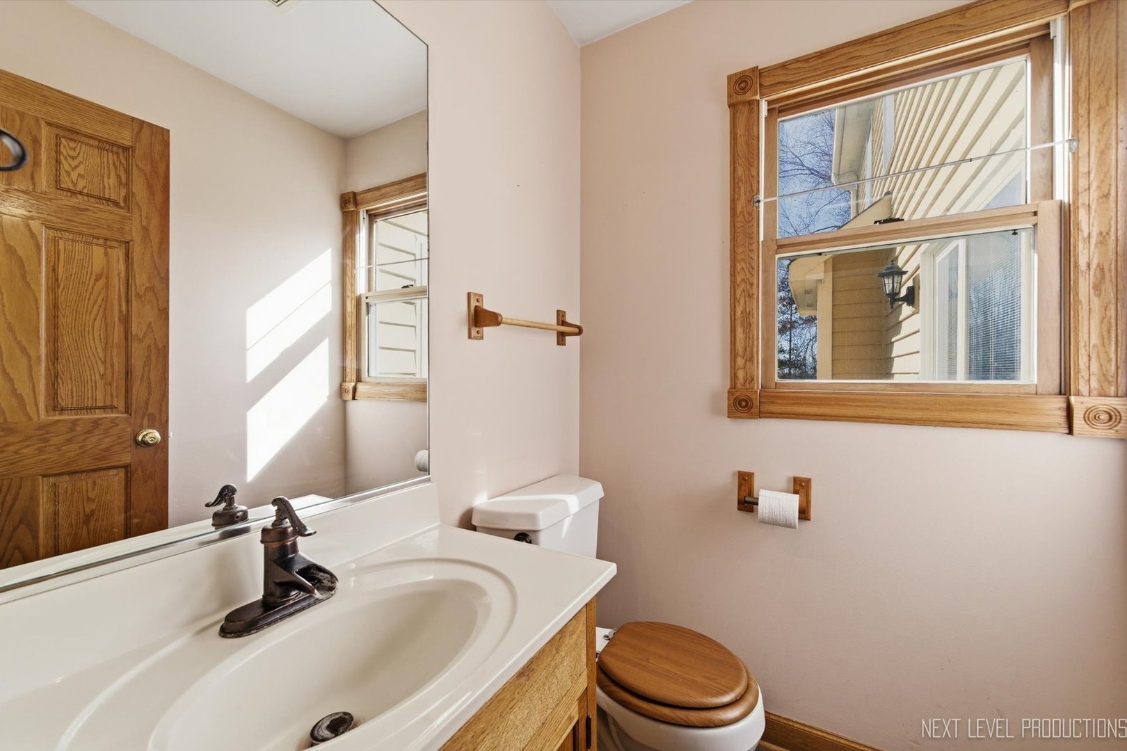 2N879 Howard Road Maple Park, IL 60151 - Photo 16 of 54 a bathroom with a sink a toilet and a mirror