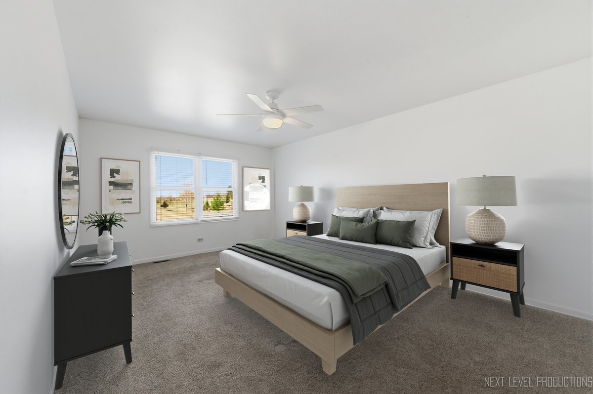 2N879 Howard Road Maple Park, IL 60151 - Photo 19 of 54 a spacious bedroom with a bed and a lamp