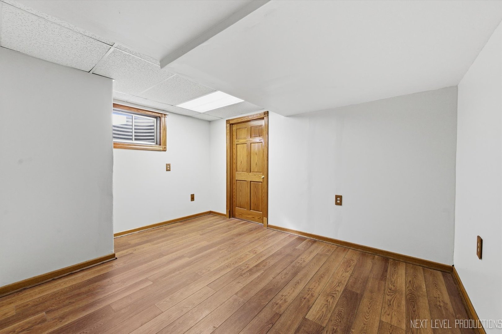 2N879 Howard Road Maple Park, IL 60151 - Photo 30 of 54 a view of an empty room with wooden floor and a window