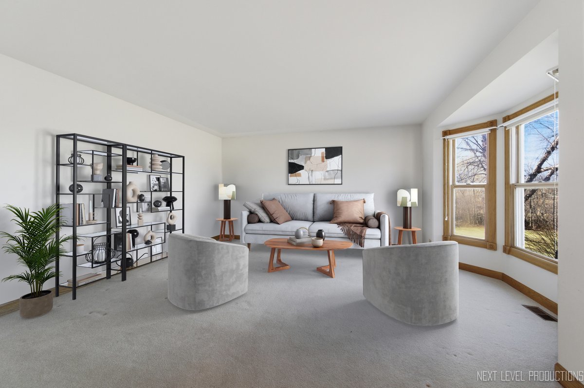 2N879 Howard Road Maple Park, IL 60151 - Photo 7 of 54 a living room with furniture and a large window