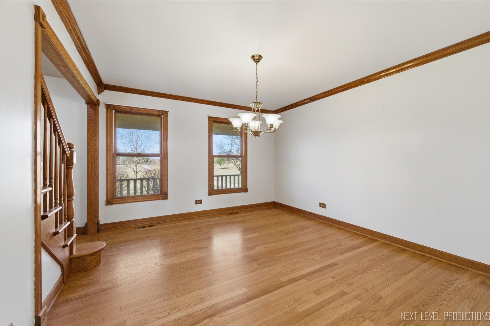 2N879 Howard Road Maple Park, IL 60151 - Photo 8 of 54 a view of an empty room with a window and wooden floor