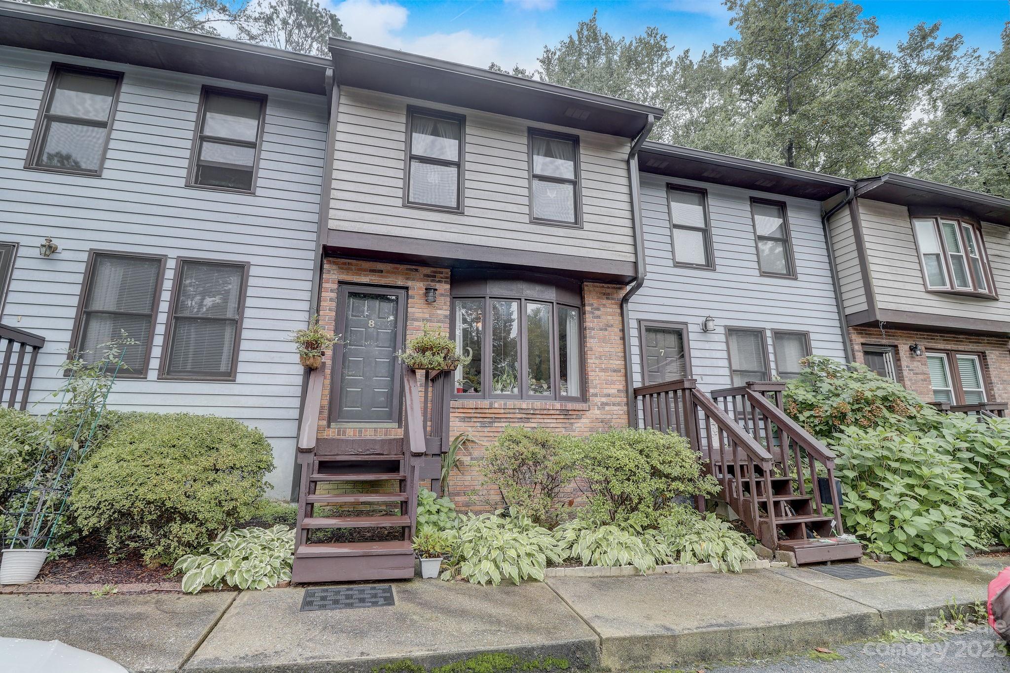 4 Bramblewood Road, Unit 8 Arden, NC 28704 - Photo 2 of 25 a front view of a house