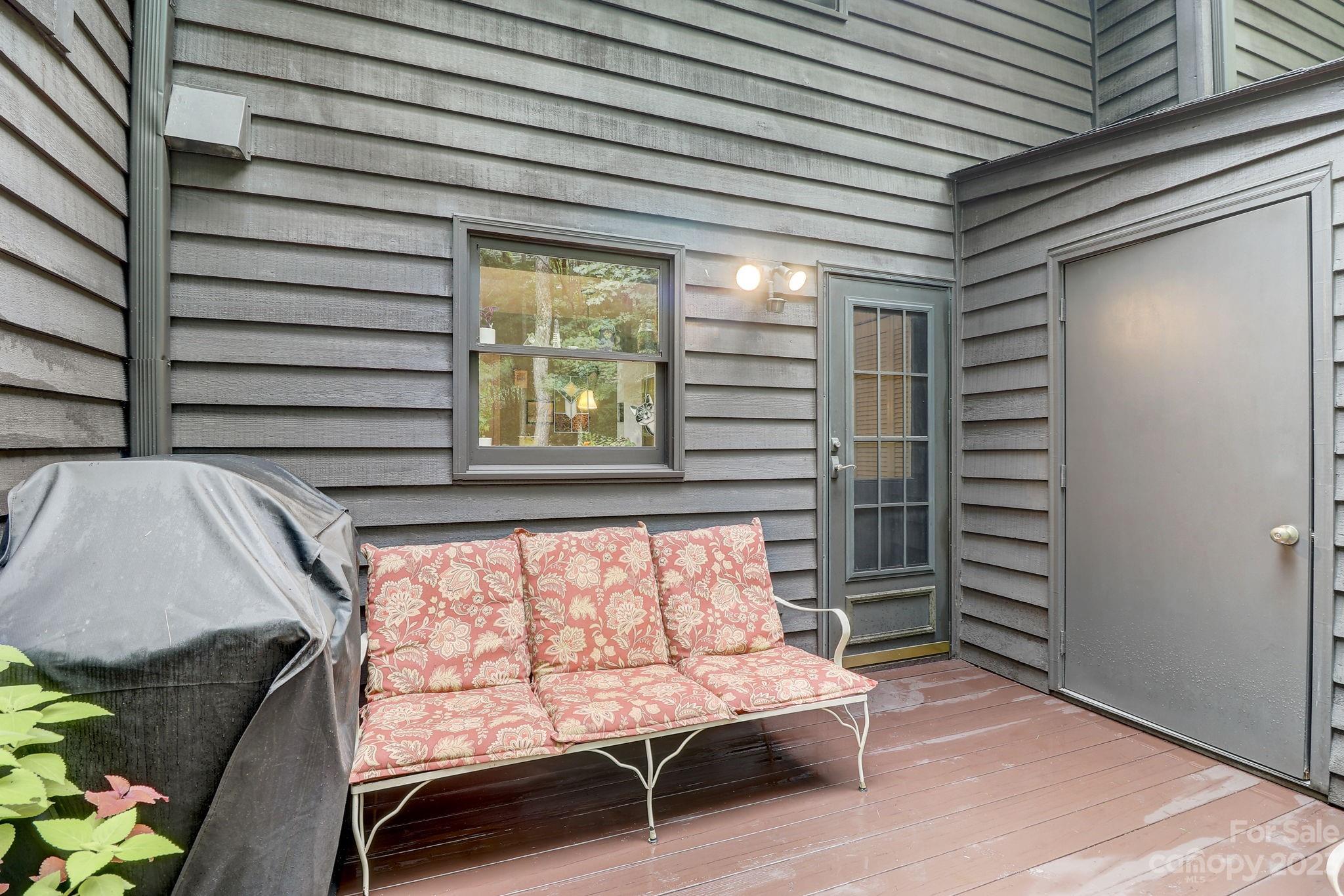 4 Bramblewood Road, Unit 8 Arden, NC 28704 - Photo 22 of 25 a bedroom with furniture and a window