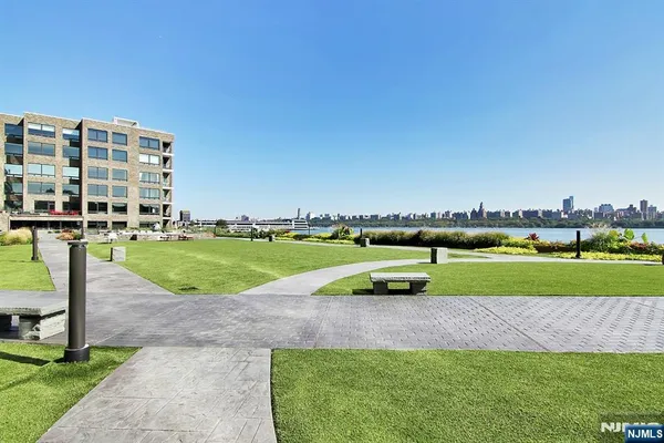 a view of a playground with a patio