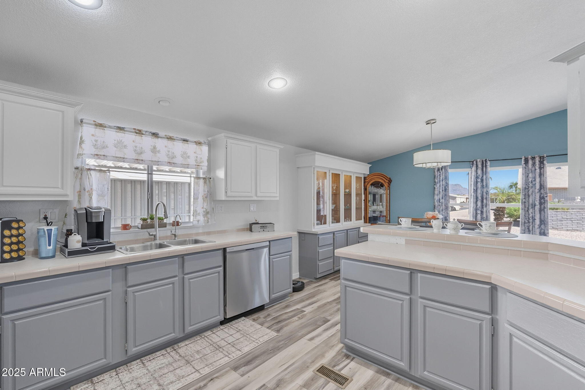 3700 South Tomahawk Road, Unit 39 Apache Junction, AZ 85119 - Photo 22 of 53 a kitchen with sink and window