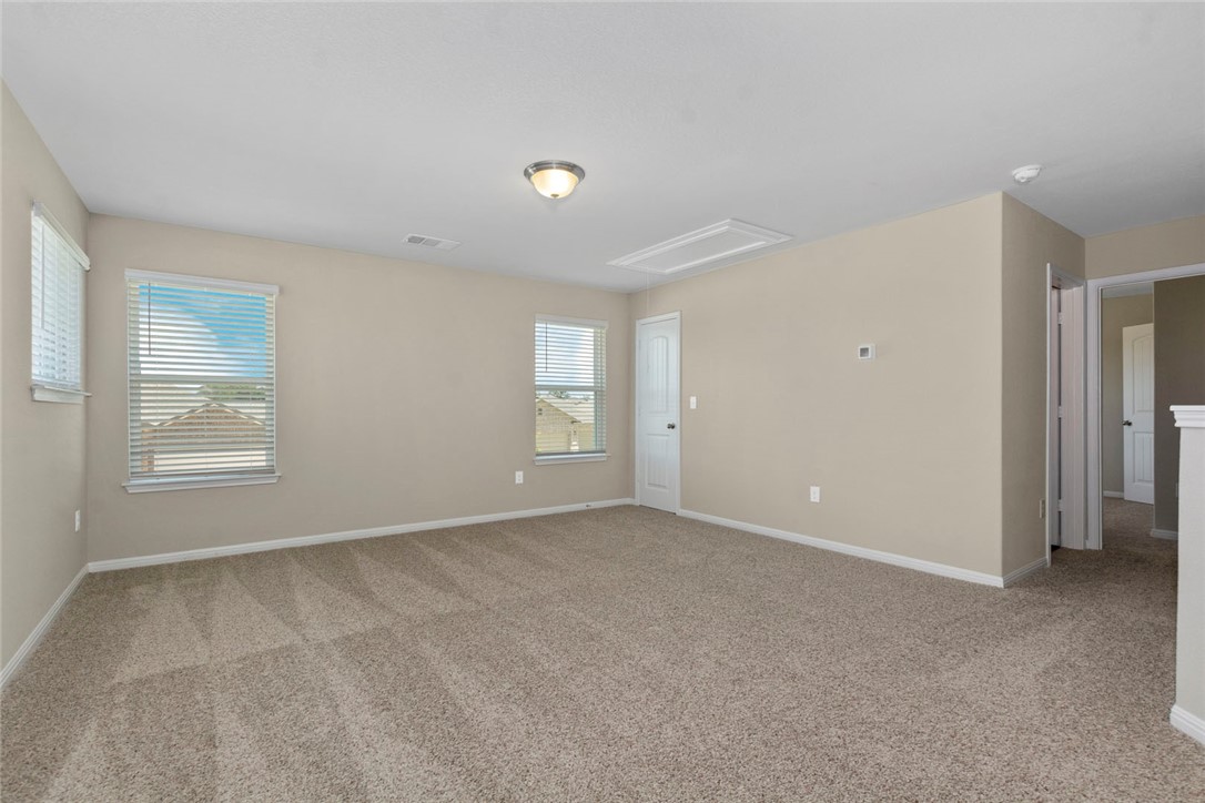 4217 Porter Farm Road Georgetown, TX 78628 - Photo 13 of 17 a view of an empty room with a window