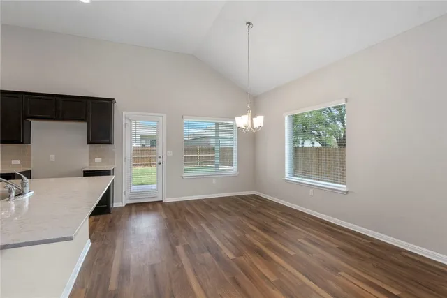 a view of a living room and hardwood floor