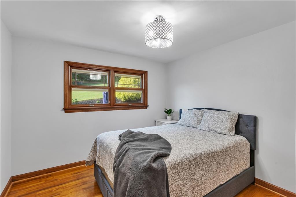 360 Orr Avenue Apollo, PA 15613 - Photo 11 of 24 a bedroom with a bed and a painting on the wall