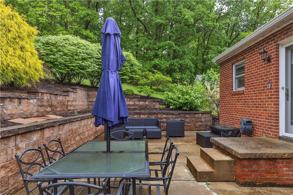 360 Orr Avenue Apollo, PA 15613 - Photo 20 of 24 a patio table with chairs and wooden fence